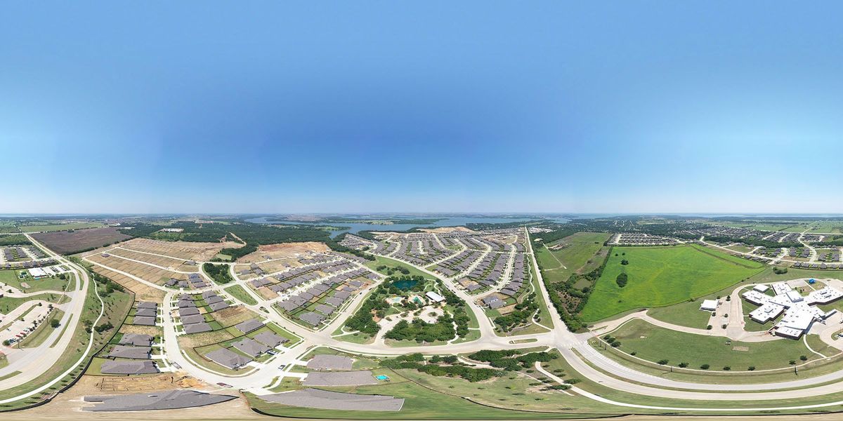 Aerial view of the Wildridge community in Oak Point, TX, showing layout and nearby surroundings (Image 1). Aerial view of the Wildridge community in Oak Point, TX, showing layout and nearby surroundings (Image 1).