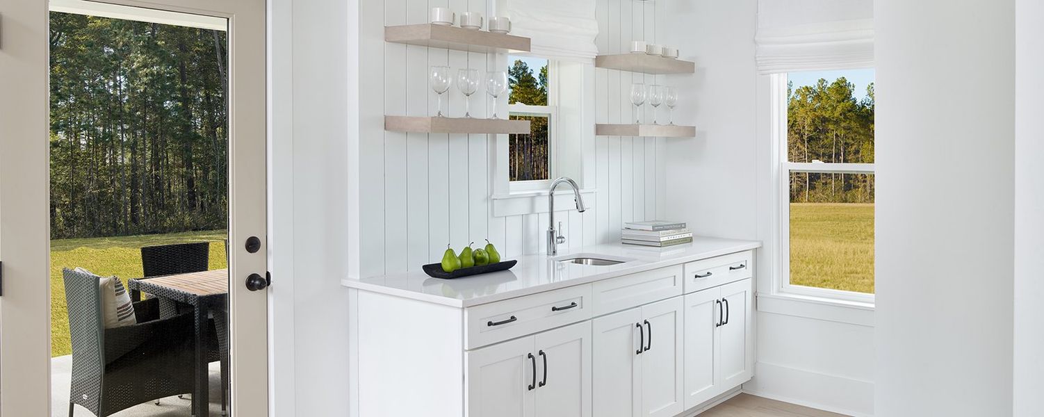 Furnished interior in a model home at Watson Hill in Summerville (Image 9). Furnished interior in a model home at Watson Hill in Summerville (Image 9).