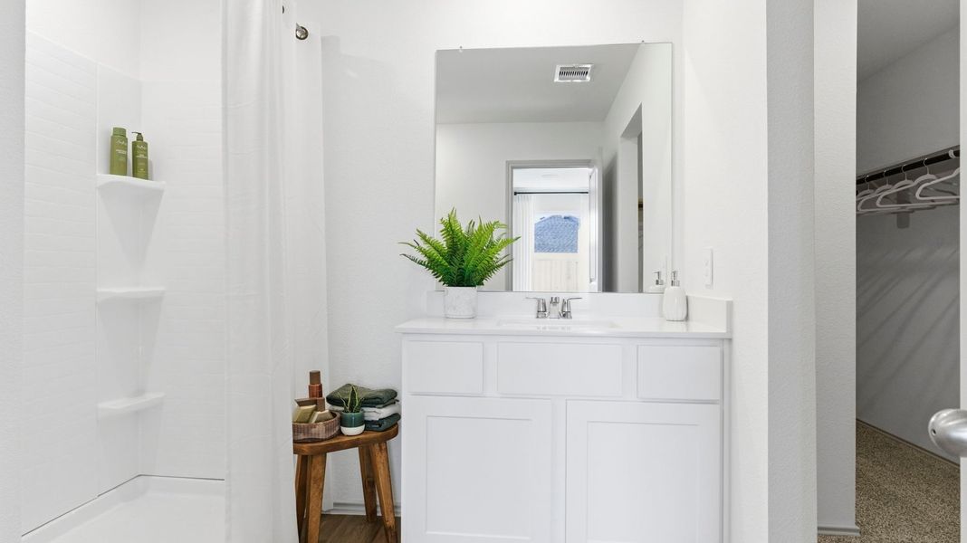 Furnished interior in a model home at Watermark in Alvin (Image 23).