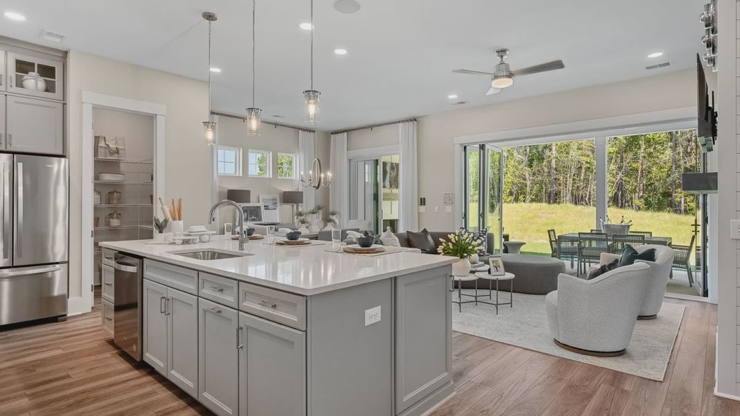 Living room and kitchen of the Enthusiast floorplan