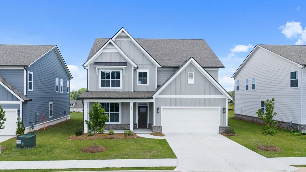 Front exterior of a home in the Hamptons at Riverwood East community, located in Dallas, GA (Image 4).
