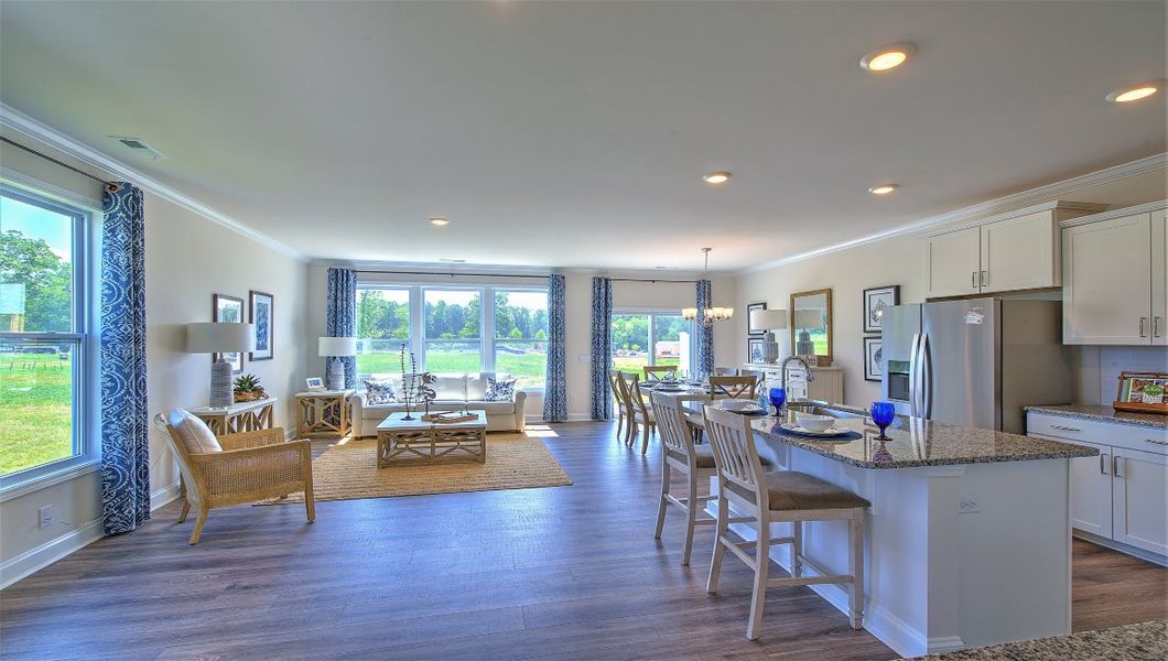 Furnished interior in a model home at Townes at Tap Root Farms in Fletcher (Image 7).