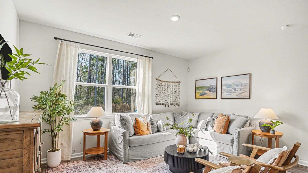 Furnished interior in a model home at Winfield Farms in Myrtle Beach (Image 8).