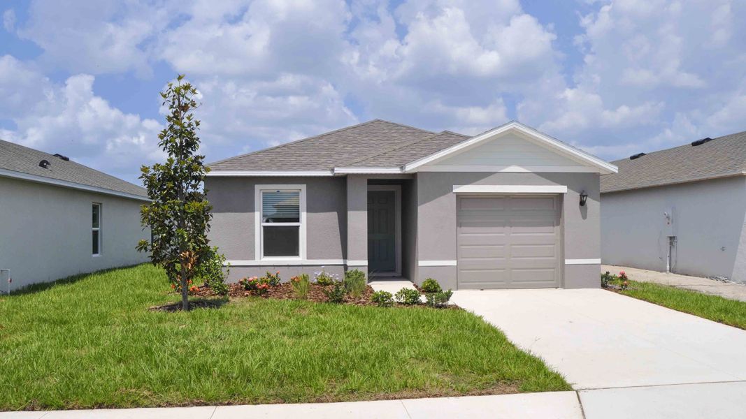 Front exterior of a home in the Oakfield Lakes community, located in Parrish, FL (Image 21).