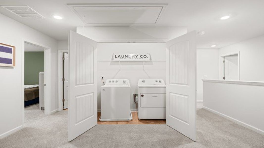 Furnished interior in a model home at Falcon Landing Townhomes in Gainesville (Image 38).