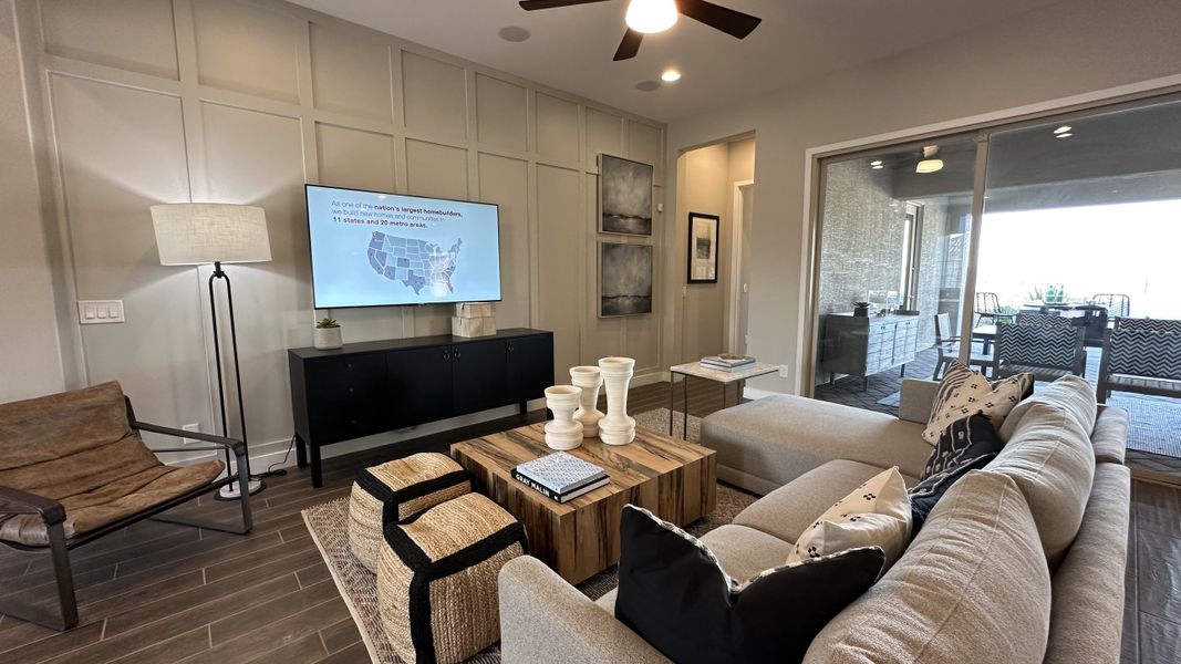 Furnished interior in a model home at CantaMia at Estrella 55+ in Goodyear (Image 24).