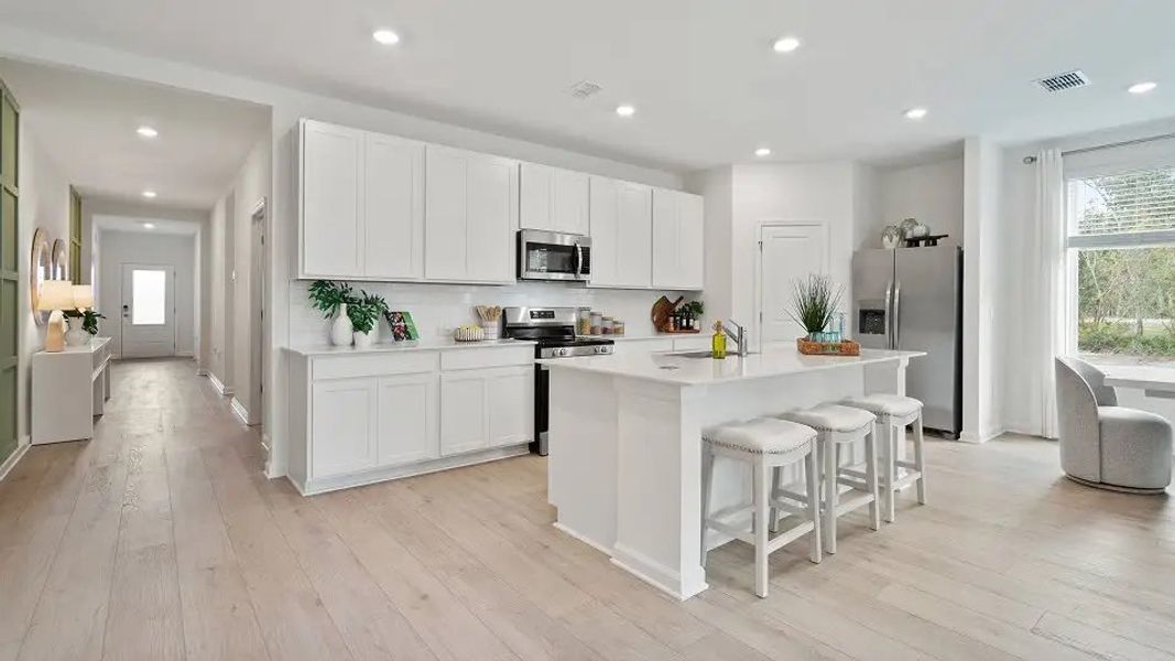 Furnished interior in a model home at Sanctuary at Wellness Ridge: Classic in Clermont (Image 4).