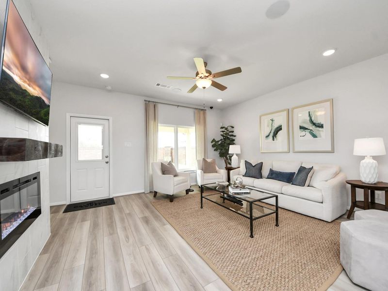 Furnished interior in a model home at Sunterra in Katy (Image 17).