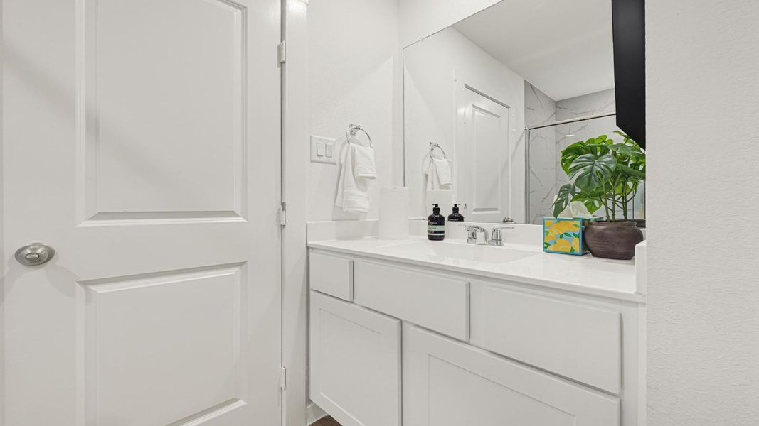 Furnished interior in a model home at Westward Pointe in Sealy (Image 22).