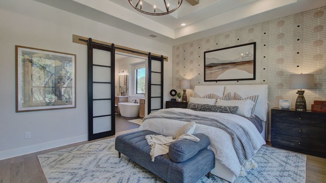 Contemporary elegance meets rustic charm with exposed beams and chic sliding doors in San Antonio.