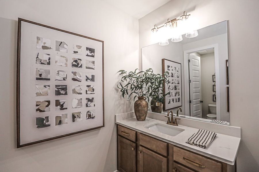 Furnished interior in a model home at Walker Farms in Bartlett (Image 29).