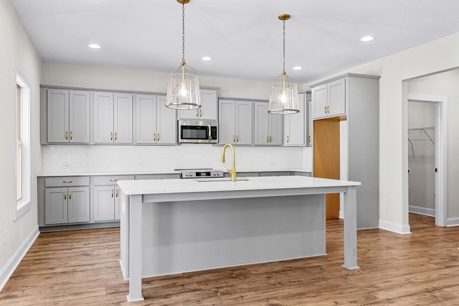 Furnished interior in a model home at Deer Creek in Moreland (Image 9).