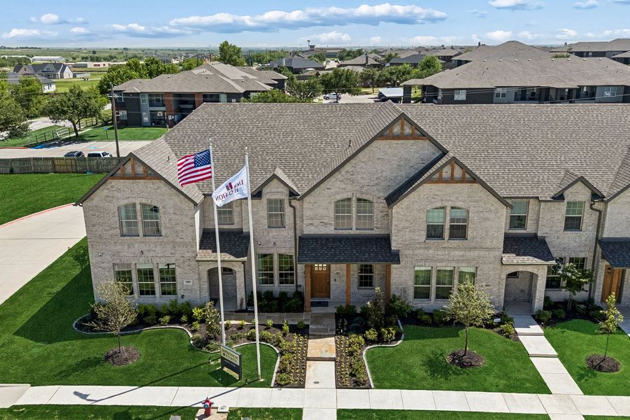 Front exterior of a home in the Sanger Circle – Townhomes community, located in Sanger, TX (Image 36). Front exterior of a home in the Sanger Circle – Townhomes community, located in Sanger, TX (Image 36).