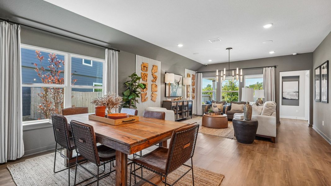 Dining Area opens to the Great Room, with plenty of windows to allow natural light to flow in.
