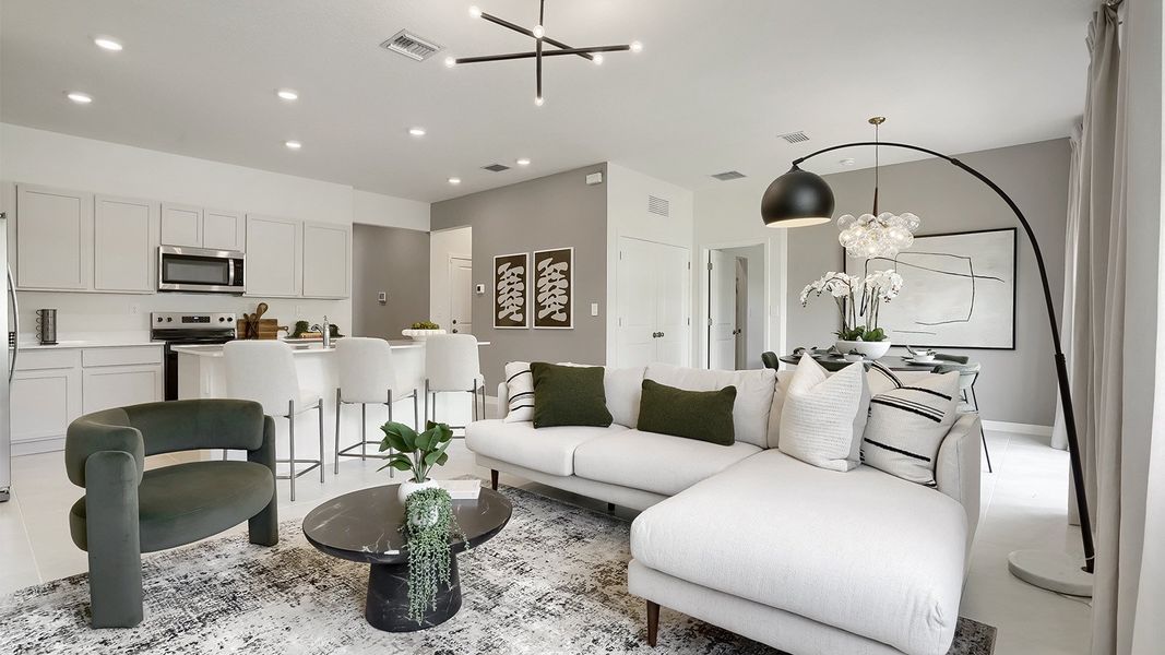 Furnished interior in a model home at Juniper Cove in Homestead (Image 3).
