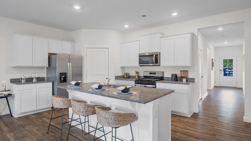 Furnished interior in a model home at Hillcrest Landing in McDonald (Image 13).