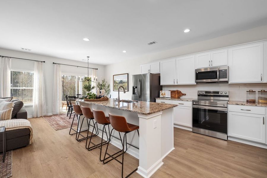 Furnished interior in a model home at Belair East in Statesboro (Image 4).