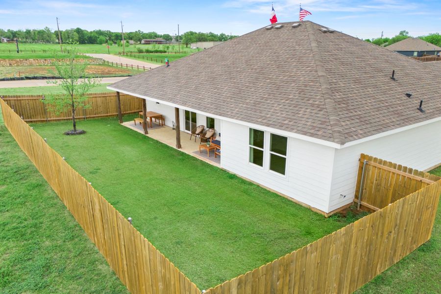 A house with a grass yard. A house with a grass yard.