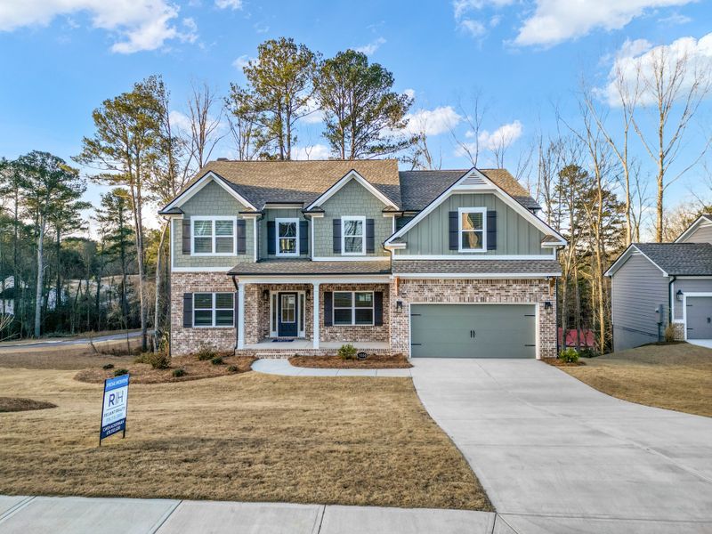 Front exterior of a home in the Woodland Hills community, located in Loganville, GA (Image 4). Front exterior of a home in the Woodland Hills community, located in Loganville, GA (Image 4).
