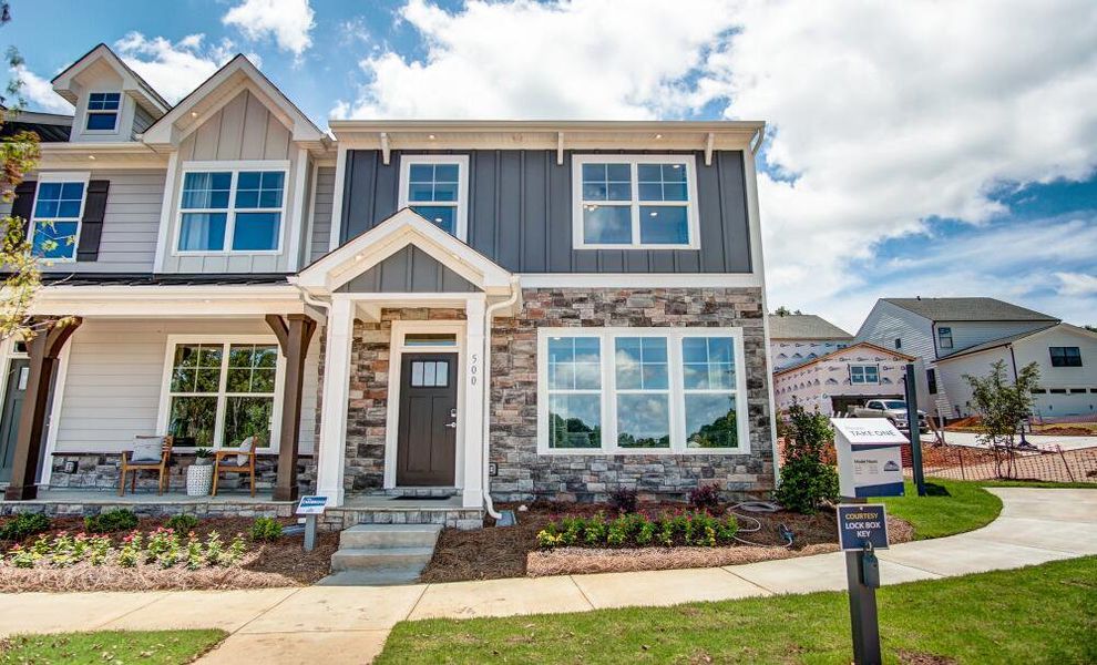 Front exterior of a home in the Bryton Crossing Townhomes community, located in Huntersville, NC (Image 1). Front exterior of a home in the Bryton Crossing Townhomes community, located in Huntersville, NC (Image 1).