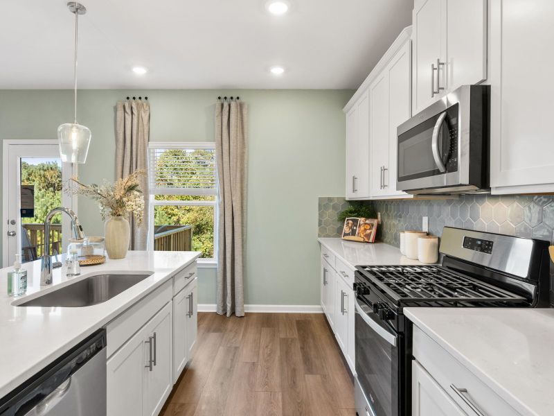 Furnished interior in a model home at Harmony Manor in Fairburn (Image 9).