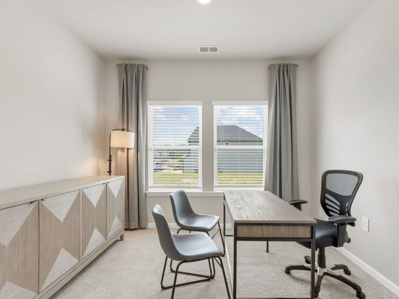 Furnished interior in a model home at Northwoods at Mirror Lake in Villa Rica (Image 9).