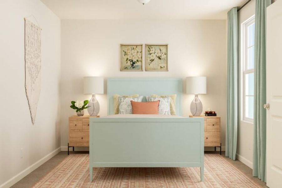 A bedroom with a bed and lamps. A bedroom with a bed and lamps.