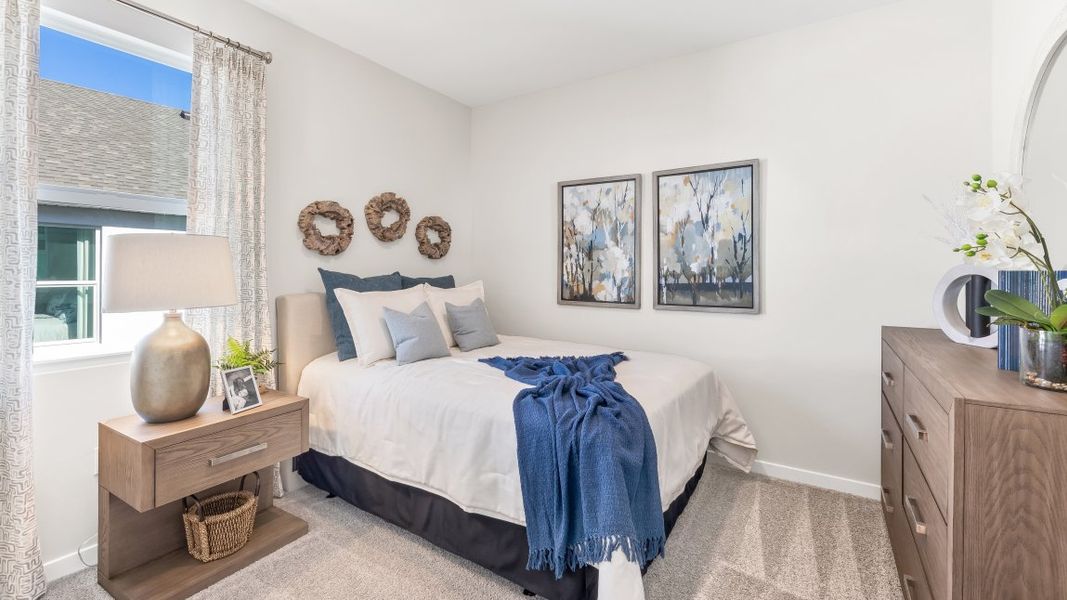 Furnished interior in a model home at Coral Lakes - Tradition & Express in Punta Gorda (Image 23).