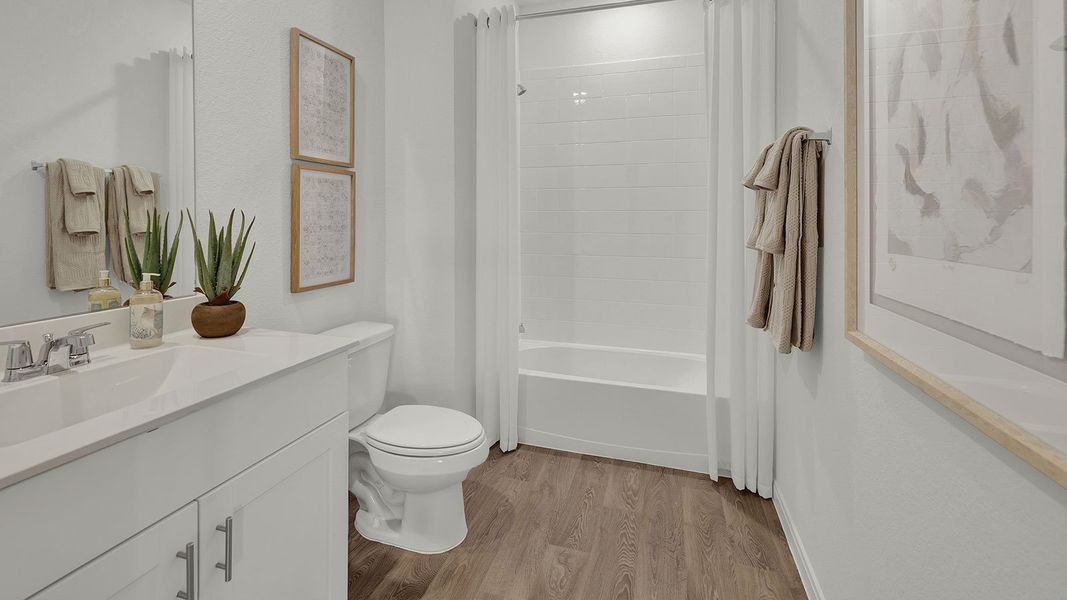 Furnished interior in a model home at Paramount in Kyle (Image 16).