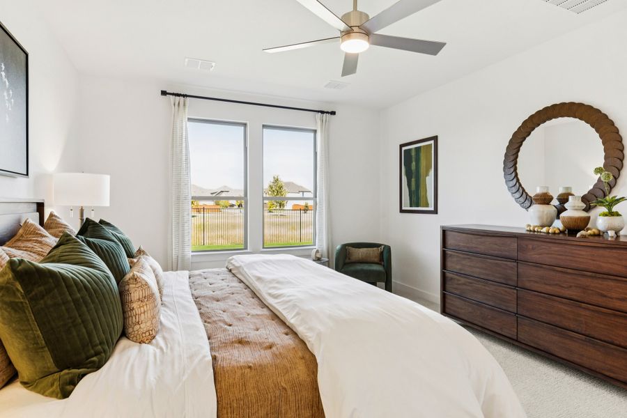 REPRESENTATIVE PHOTO – Primary Suite in the Winters model home in Aledo TX by Trophy Signature Homes