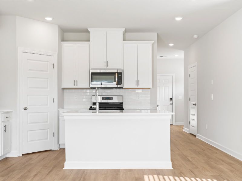 Furnished interior in a model home at Brayfield Manor - Signature Collection in Wellford (Image 2).