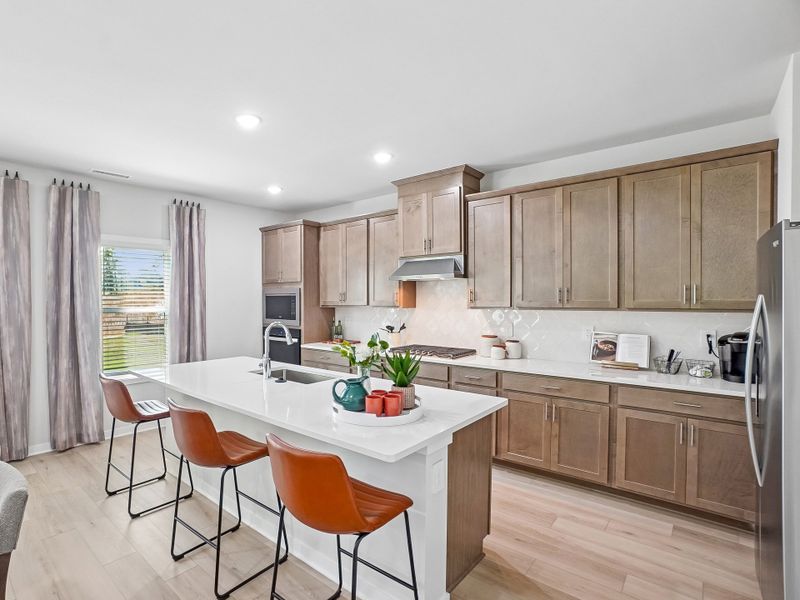 Furnished interior in a model home at Cadence Meadows in Zebulon (Image 5).