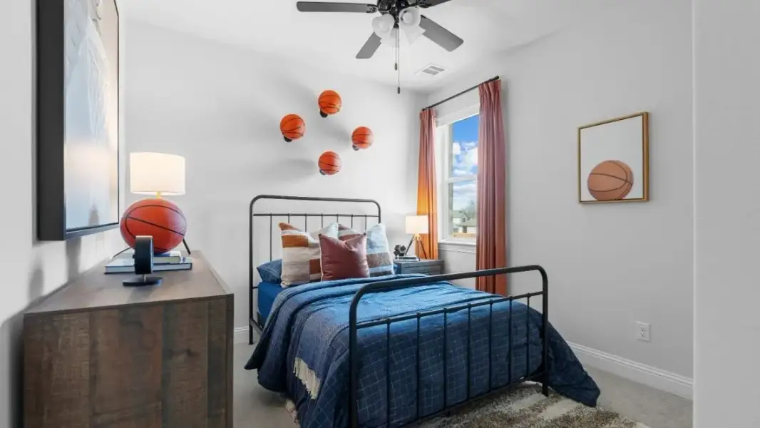 Furnished interior in a model home at White Rock Trail Addition in Dallas (Image 18).