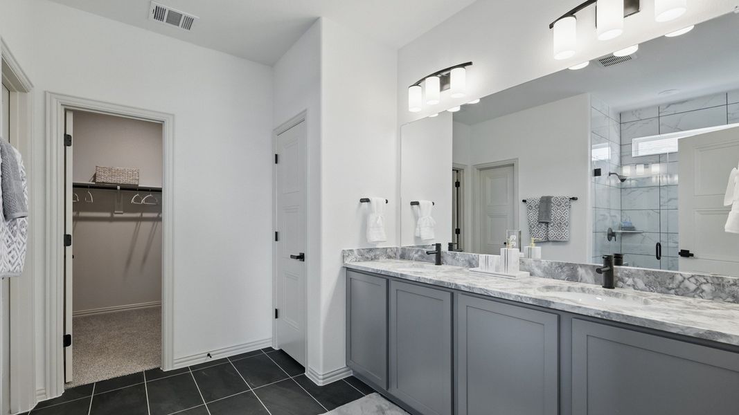 Furnished interior in a model home at Westridge Journey in McKinney (Image 29).