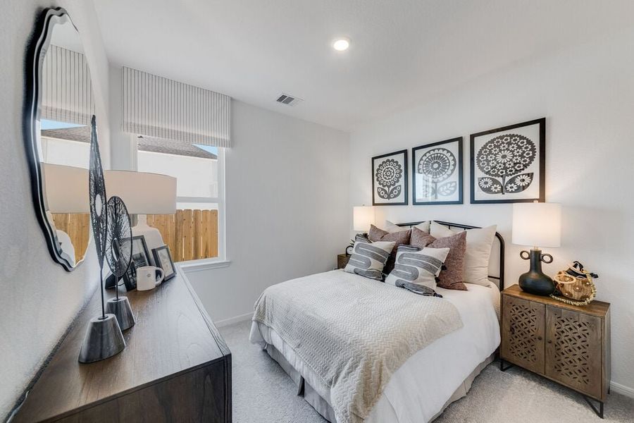 Furnished interior in a model home at Raburn Reserve 50s in Tomball (Image 55).