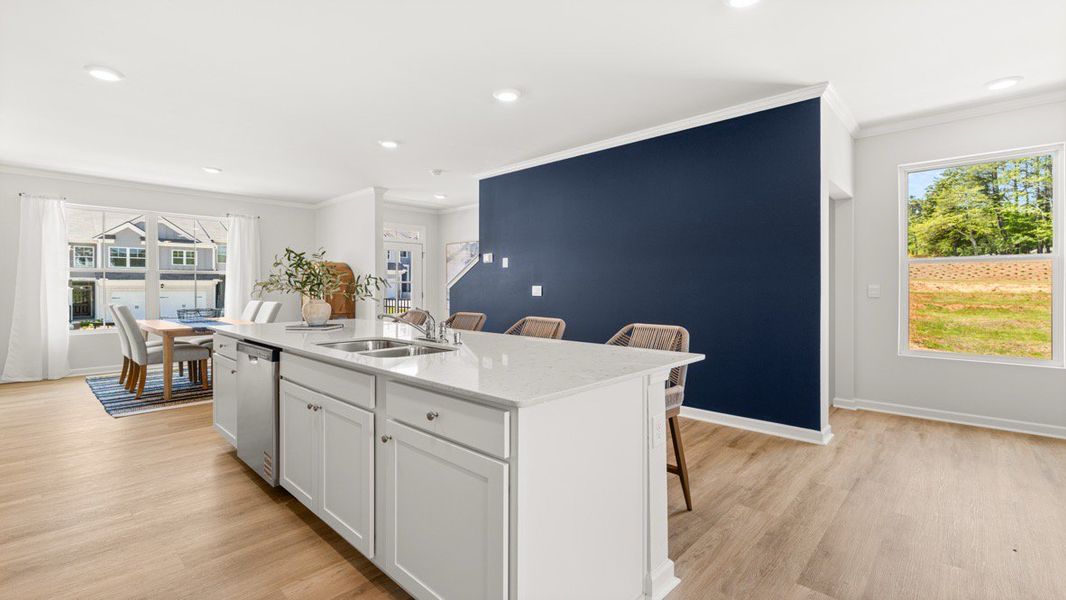 Furnished interior in a model home at Waypoint in Flowery Branch (Image 11).