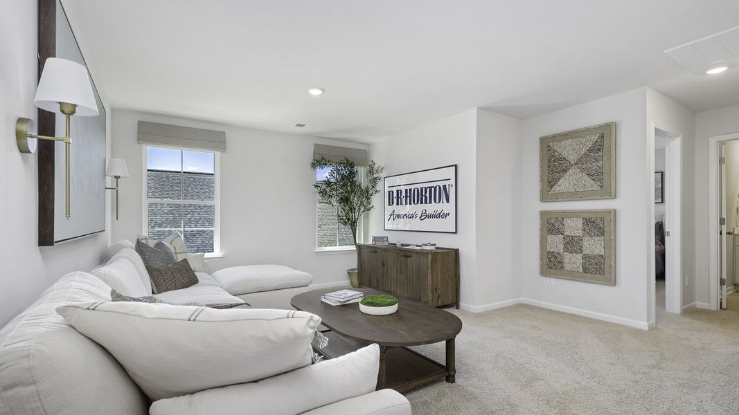 Furnished interior in a model home at The Preserve at Kinsley in Jamestown (Image 18).