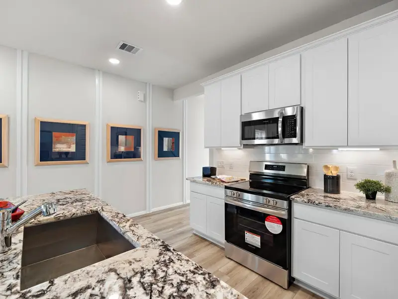 Furnished interior in a model home at Liberty Estates in Cleveland (Image 10).
