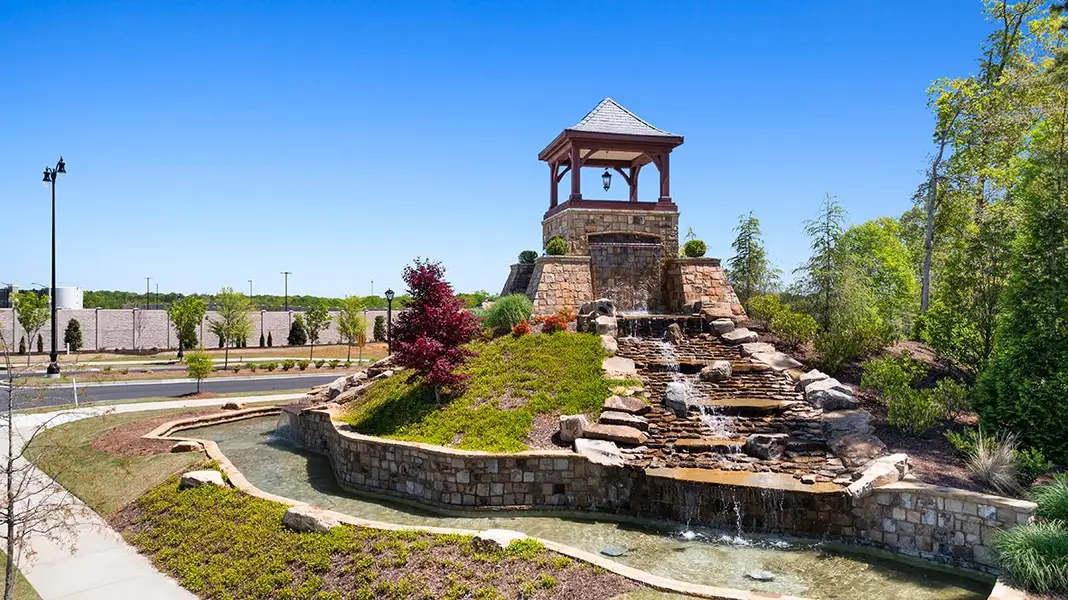Entrance to the Braselton Village community in Braselton, GA, featuring signage and landscaping (Image 2).