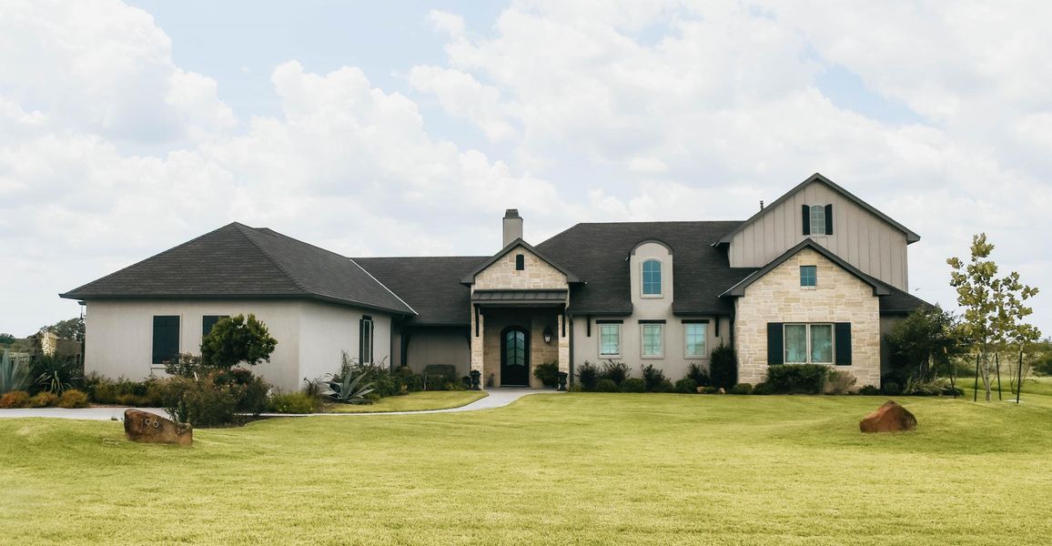 Front exterior of a home in the Escalera Ranch 1833 community, located in Victoria, TX (Image 9).