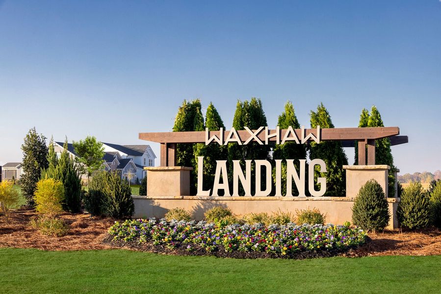 Entrance to the Waxhaw Landing community in Monroe, NC, featuring signage and landscaping (Image 9). Entrance to the Waxhaw Landing community in Monroe, NC, featuring signage and landscaping (Image 9).