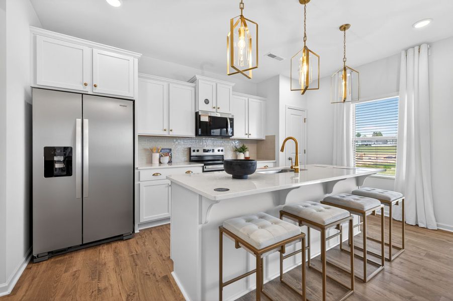 Furnished interior in a model home at Oaks at St Martin in Oakboro (Image 3).