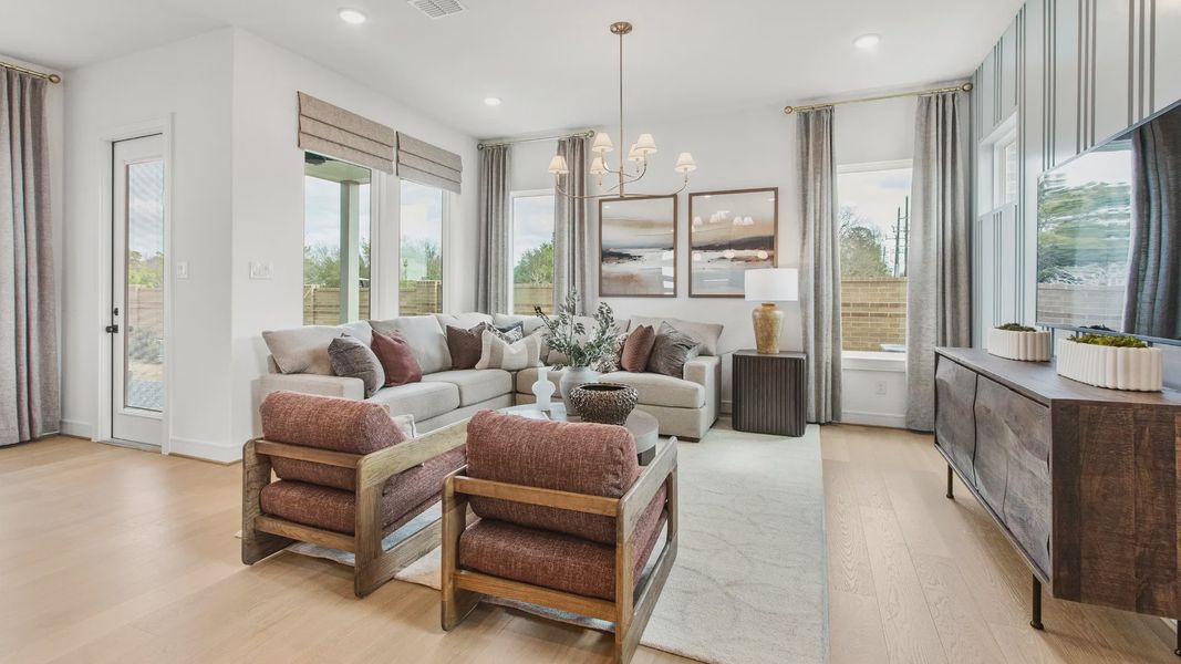 Furnished interior in a model home at Bridgeland Central in Cypress (Image 29).