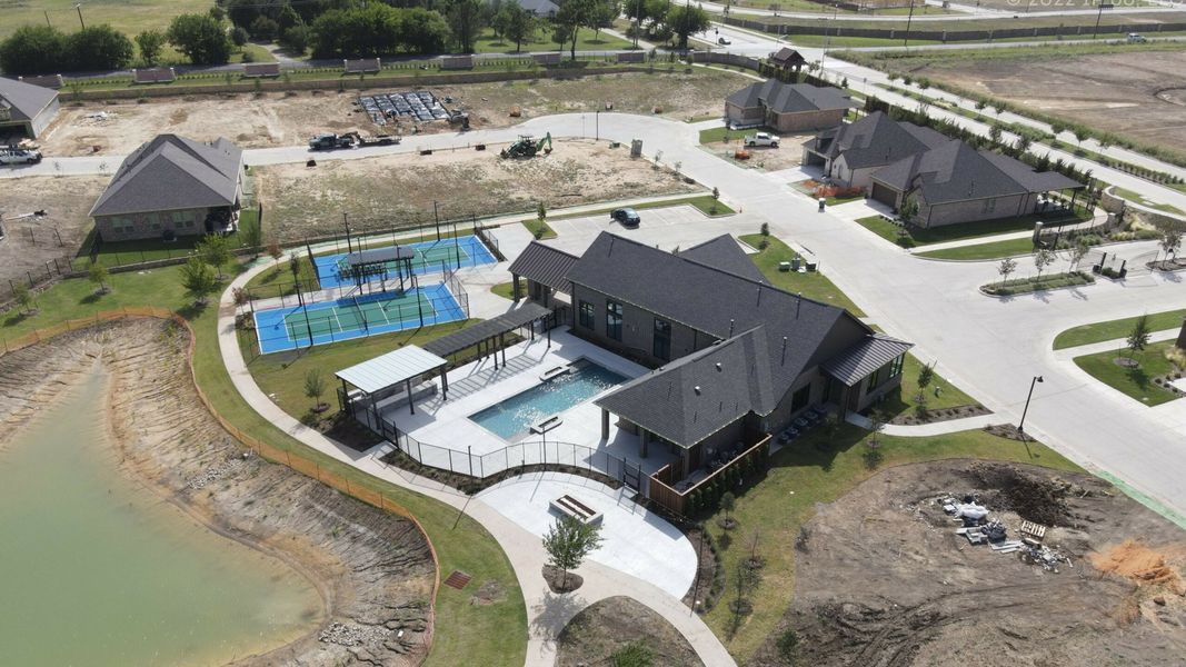 Aerial view of the Ladera at the Reserve at Mansfield community in Mansfield, TX, showing layout and nearby surroundings (Image 14). Aerial view of the Ladera at the Reserve at Mansfield community in Mansfield, TX, showing layout and nearby surroundings (Image 14).