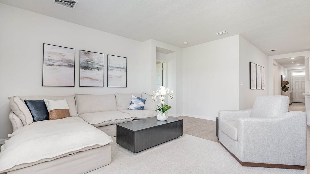 Furnished interior in a model home at Okeechobee Spot Lots in Okeechobee (Image 9).