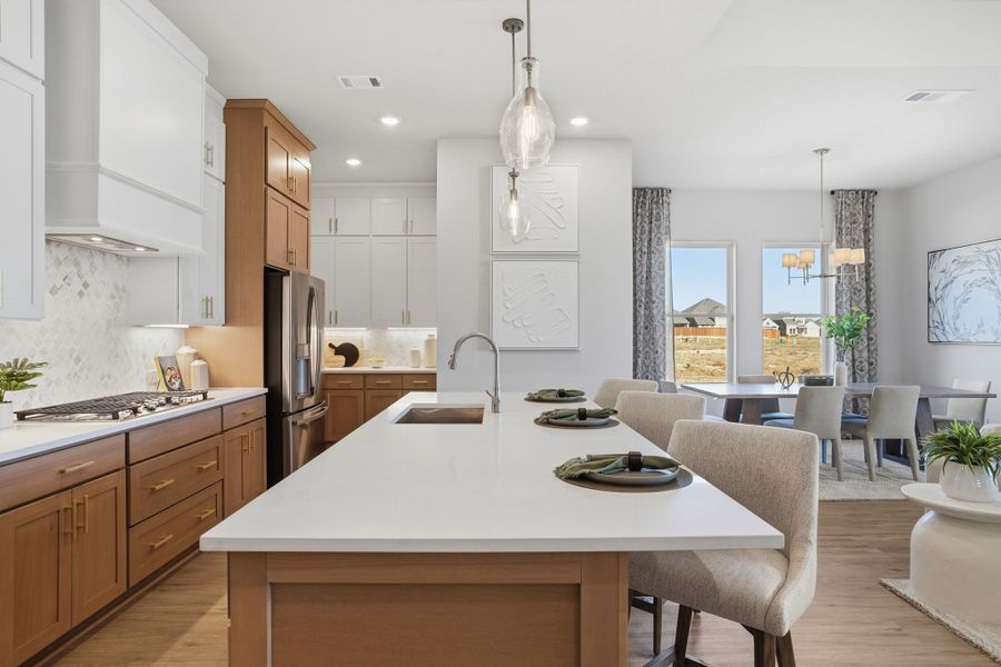 Furnished interior in a model home at Lily Creek at Sutton Fields in Aubrey (Image 98).