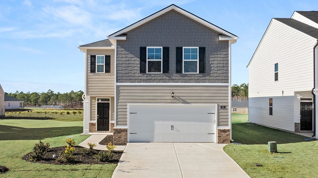 Front exterior of a home in the The Abbey at Trolley Run Station community, located in Aiken, SC (Image 10).