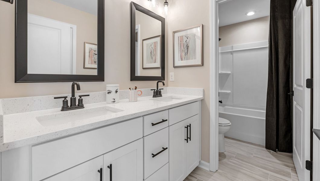 Furnished interior in a model home at Adams Glen in Greenville (Image 20).