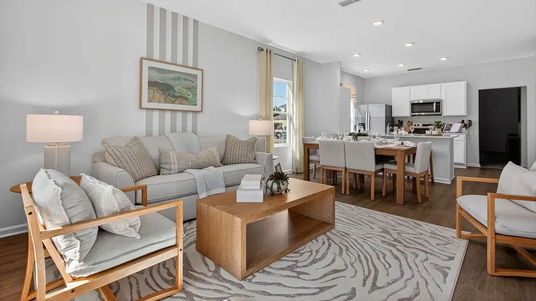 Furnished interior in a model home at Liberty Cove in Yulee (Image 3).