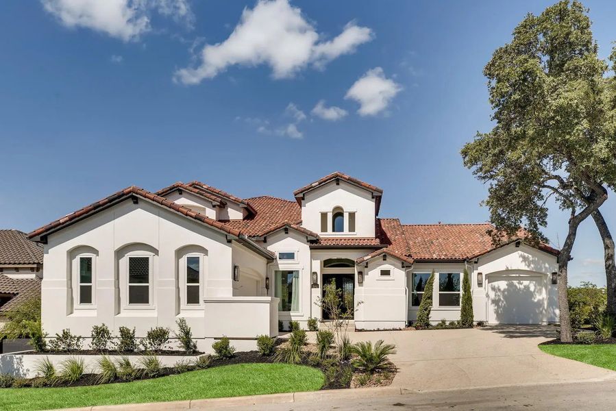 Front exterior of a home in the Andalucia At The Dominion community, located in Shavano Park, TX (Image 3).